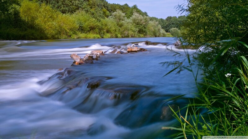 River Flowing over Rocks — Blue, Serene, Afternoon, Photograph