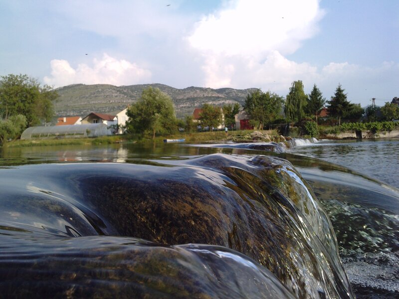 River Flowing over Rocks — Blue, Serene, Afternoon