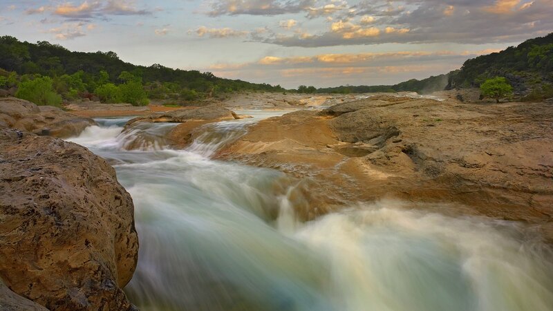 River Flowing over Rocks — Brown, Serene, Sunset, Photograph