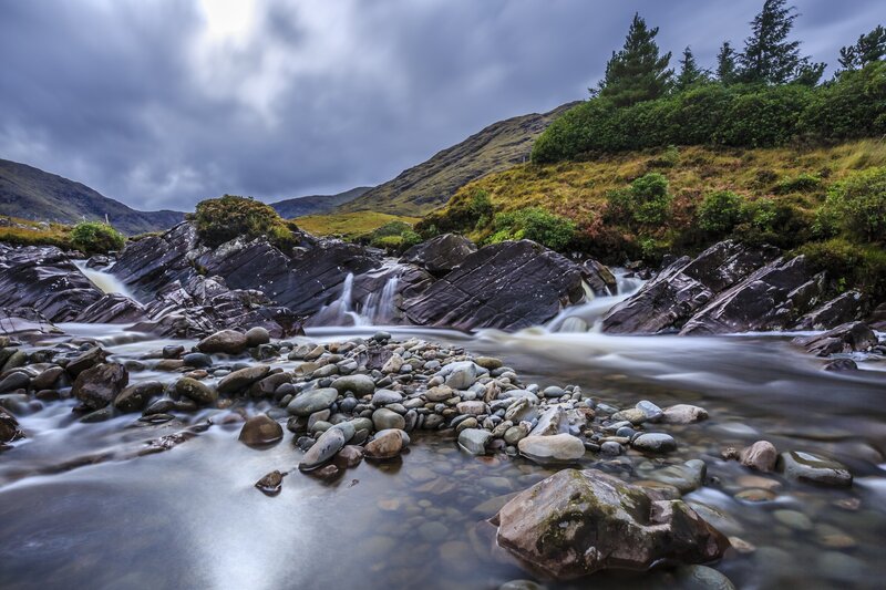 River Flowing over Rocks — Gray, Dramatic, Photograph