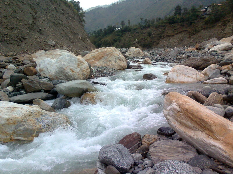 River Flowing over Rocks — Gray