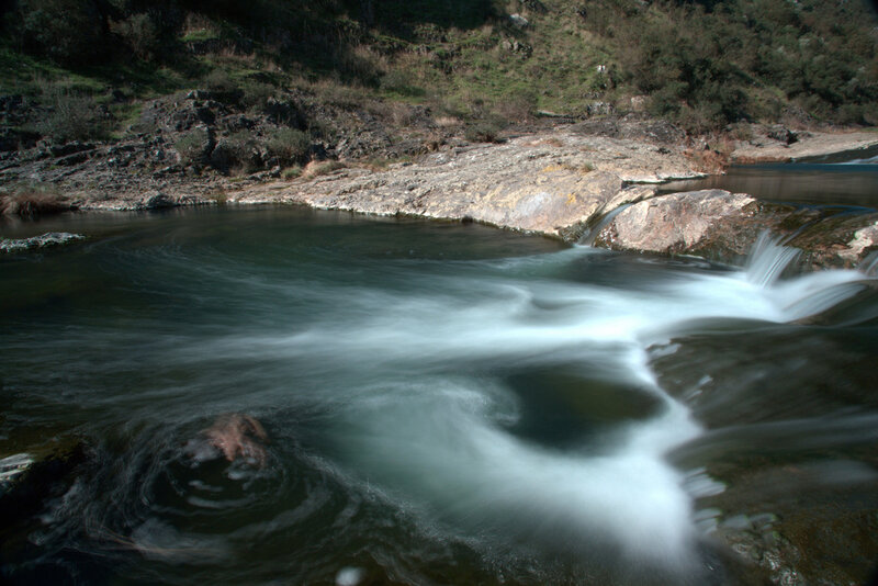 River Flowing over Rocks — Green, Calm