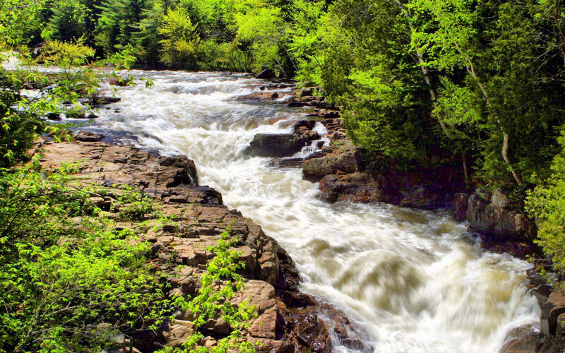 River Flowing over Rocks — Green, Dynamic, Summer