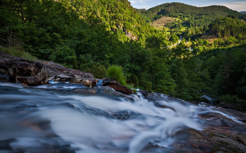 River Flowing over Rocks — Green, Serene, Afternoon, Photograph, Trees, Mountain, Blue