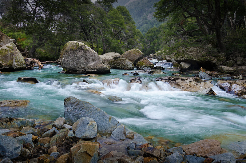 River Flowing over Rocks — Green, Serene, Photograph, Trees