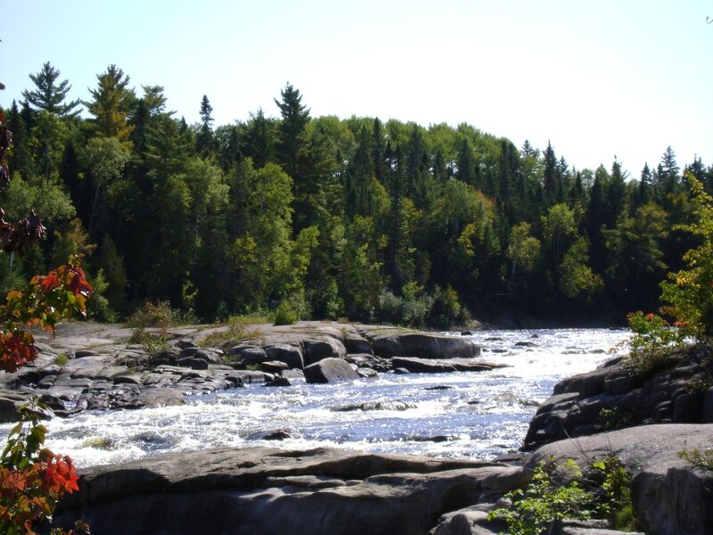 River Flowing over Rocks — Green, Serene, Summer