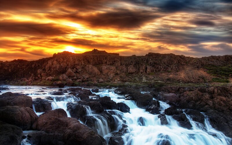River Flowing over Rocks — Orange, Dramatic, Sunset, Photograph, Sky, Sun, Brown, White