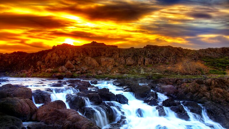 River Flowing over Rocks — Orange, Dramatic