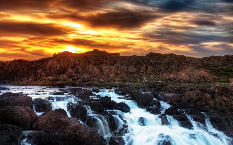 River Flowing over Rocks — Orange