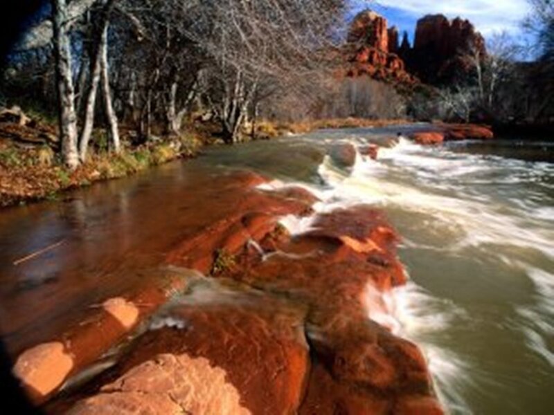 River Flowing over Rocks — Red, Serene