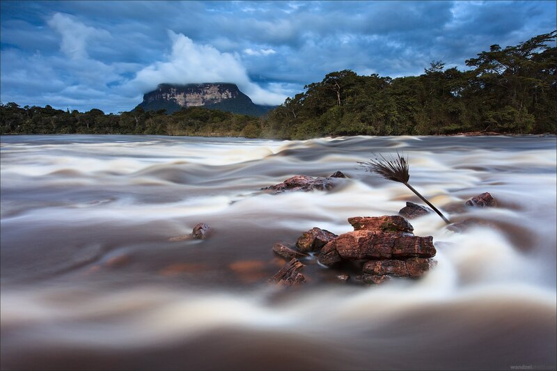 River flowing past a mountain