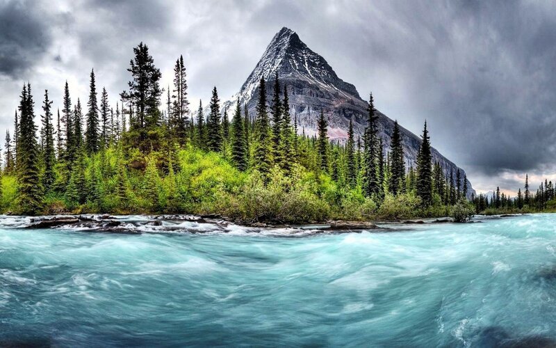 River Flowing Past Mountain — Blue, Dramatic