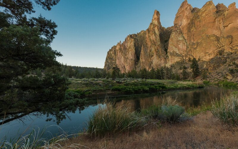 river flowing past rock formations