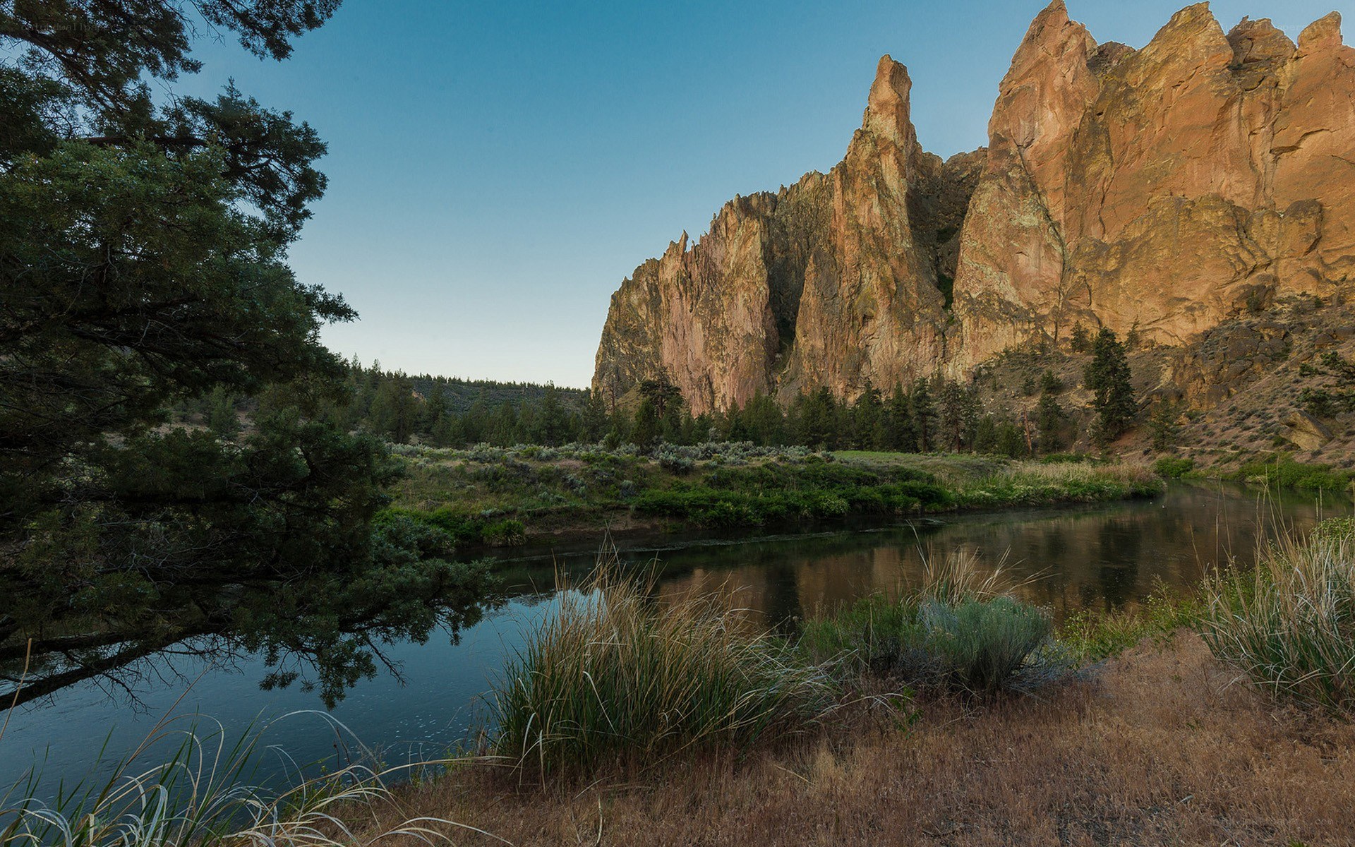 river flowing past rock formations