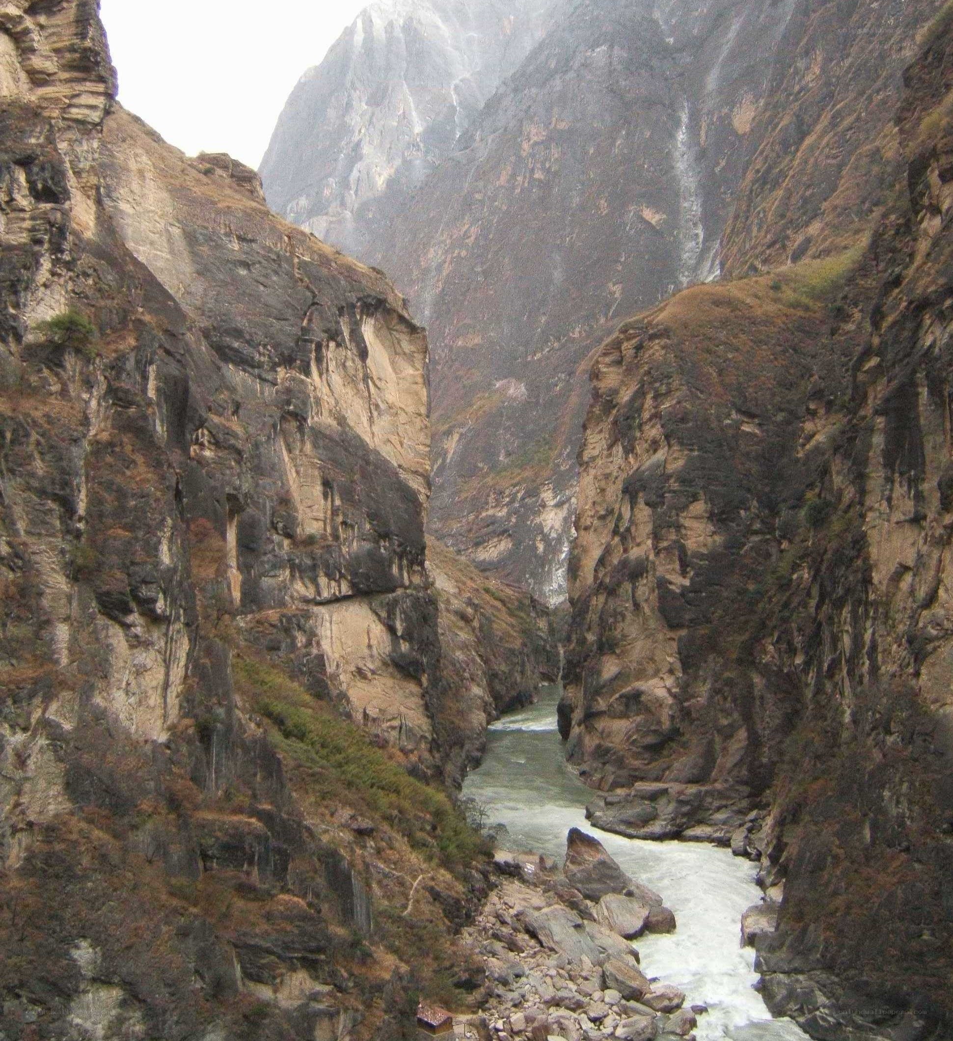 river flowing through a deep canyon