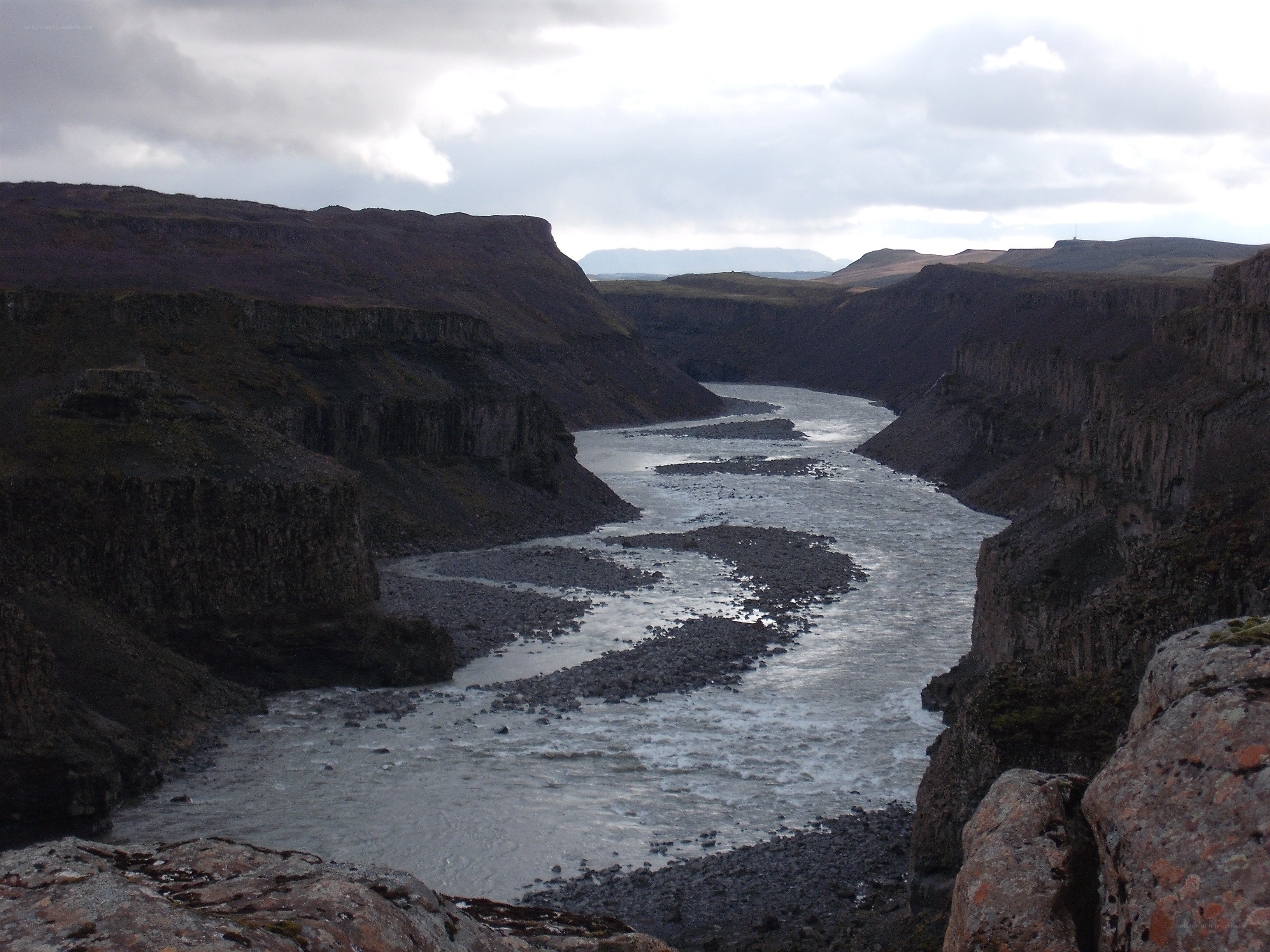 river flowing through a deep canyon
