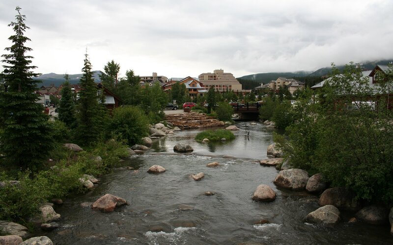 River flowing through a mountain town