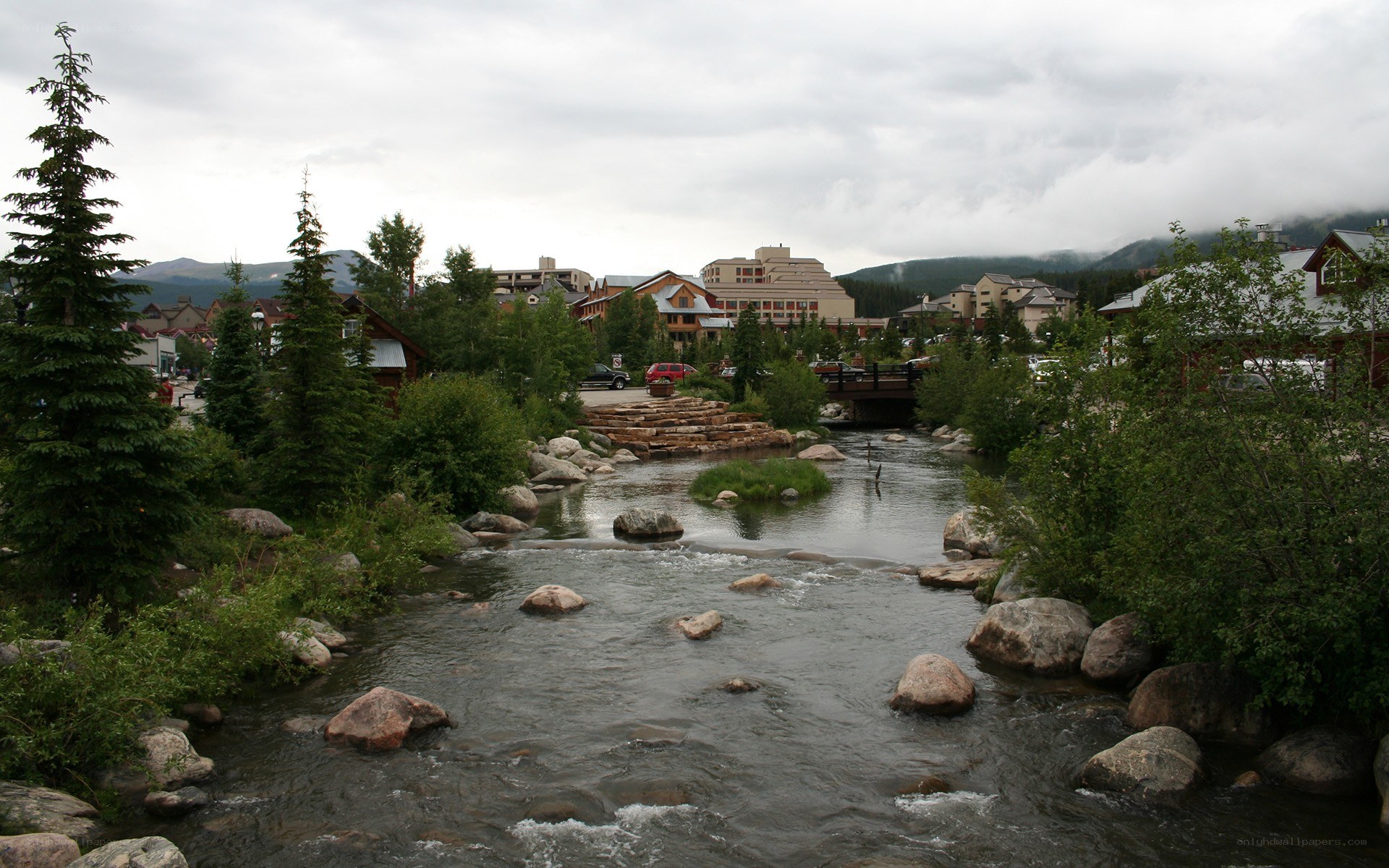 River flowing through a mountain town