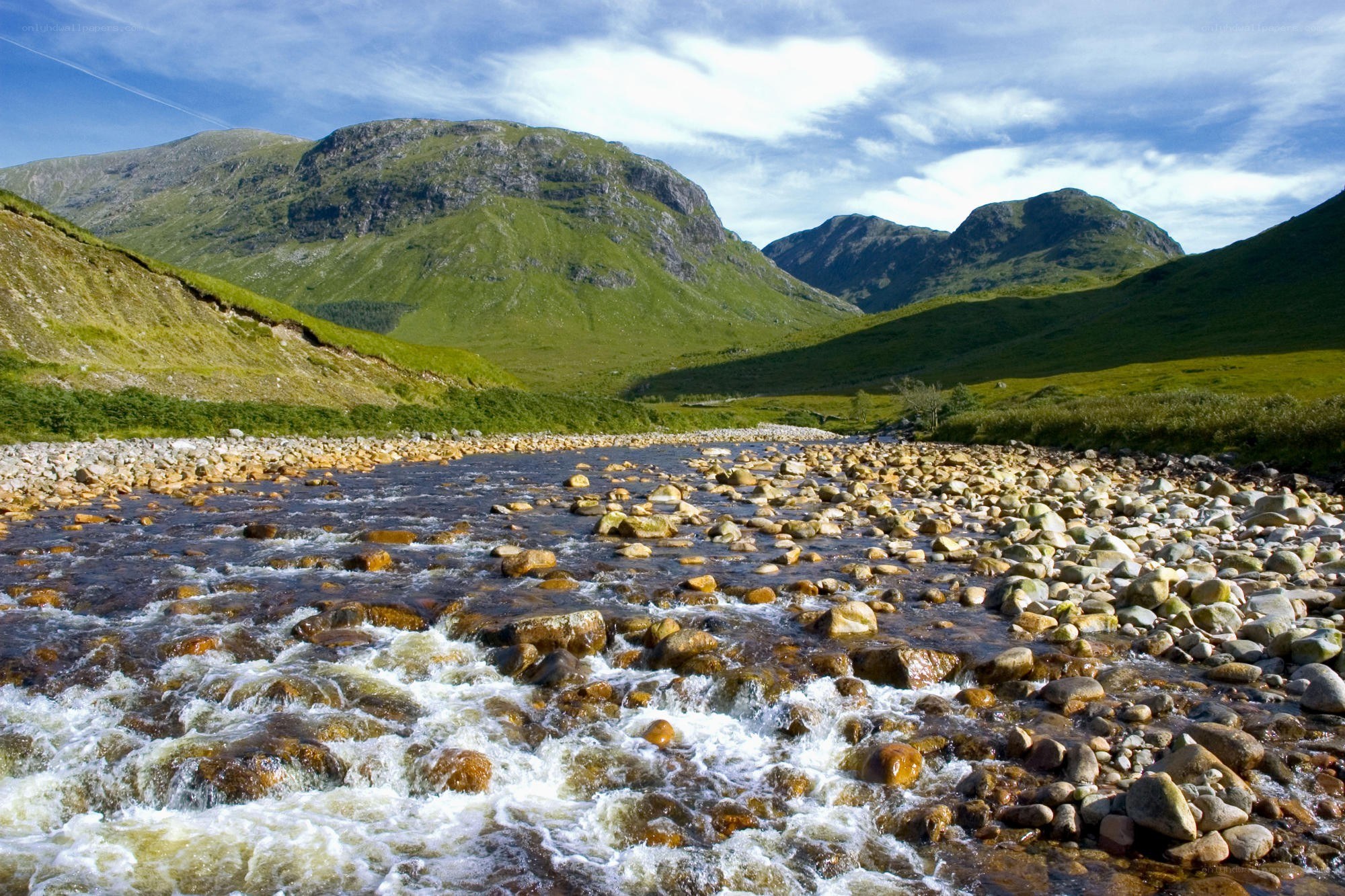 river flowing through a mountain valley
