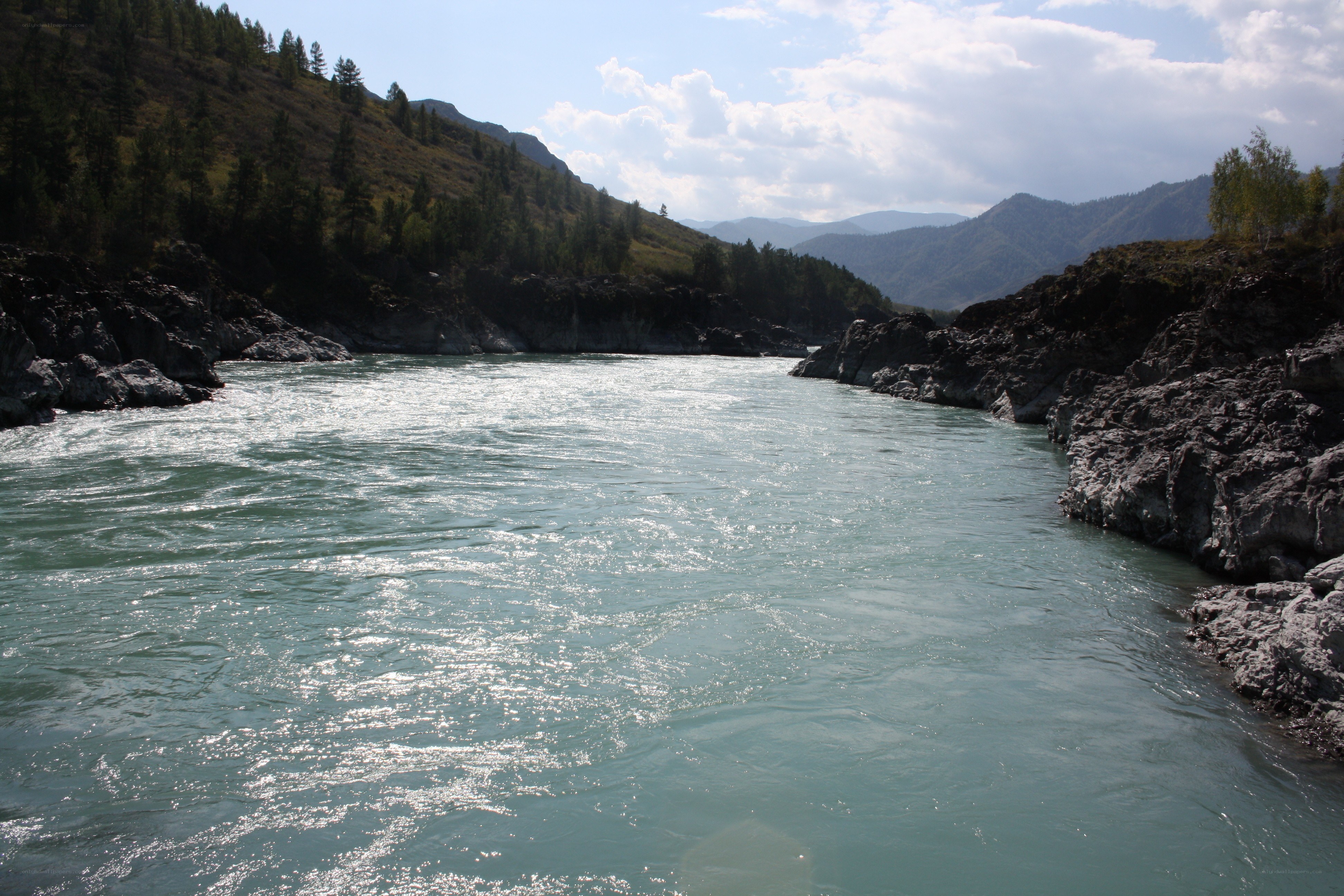 river flowing through a mountain valley