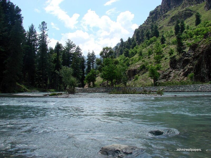 river flowing through a mountain valley