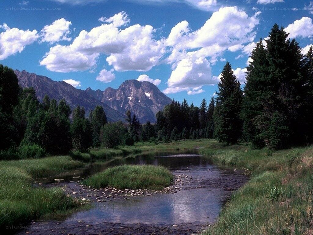 river flowing through a mountain valley
