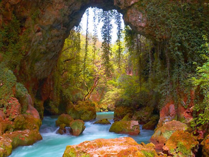 River flowing through a natural arch