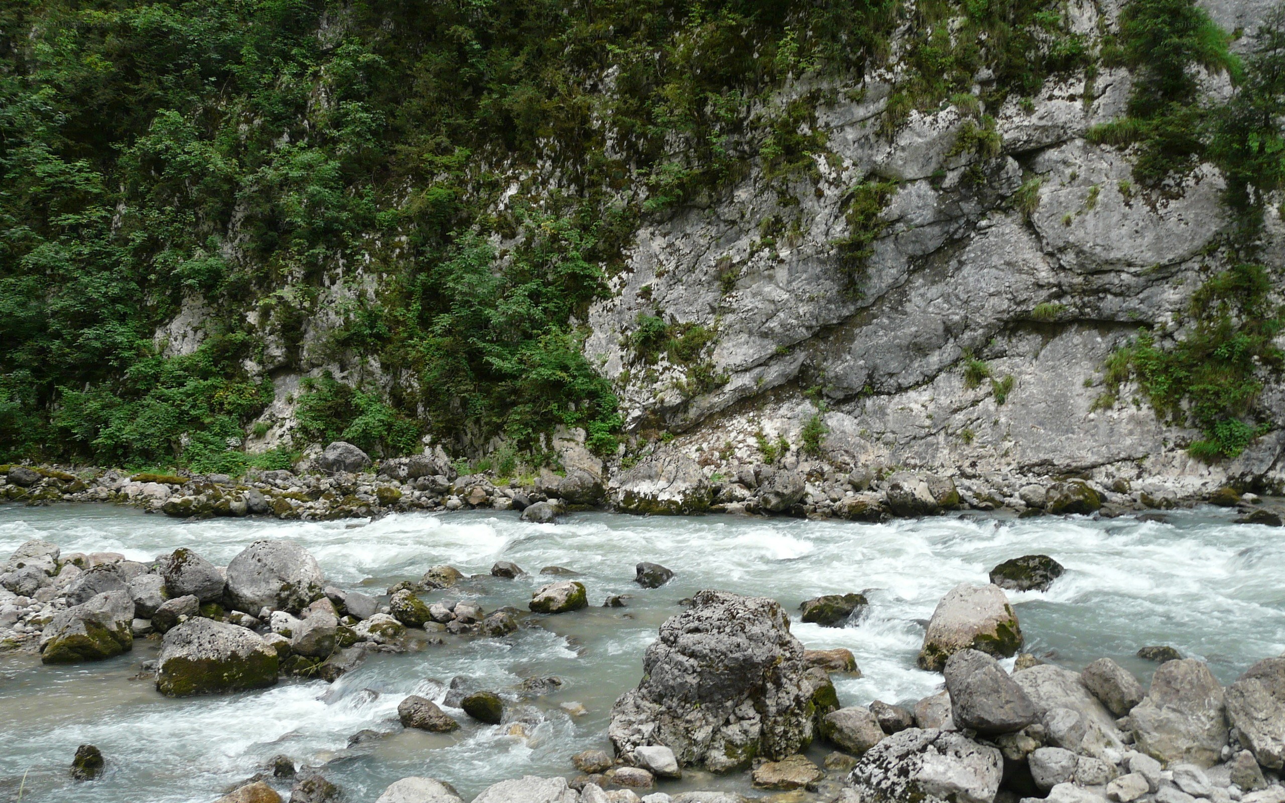 river flowing through a rocky canyon
