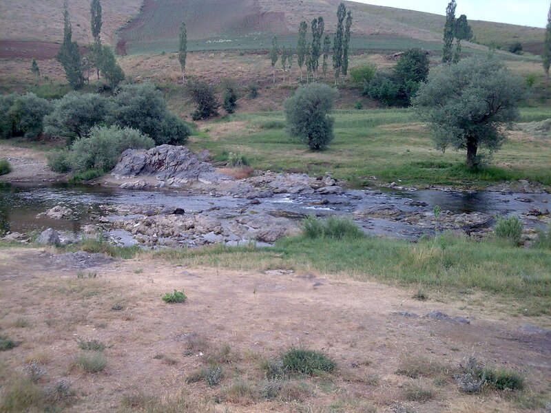 River flowing through a rural landscape