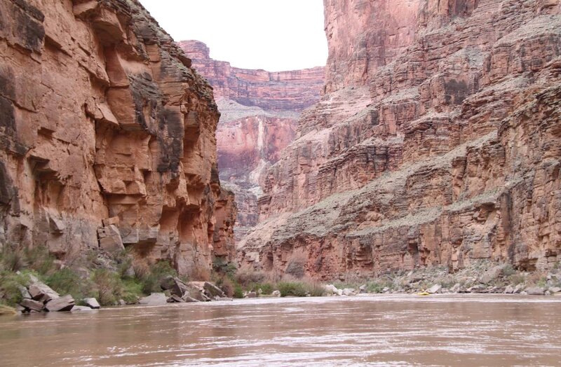 river flowing through canyon
