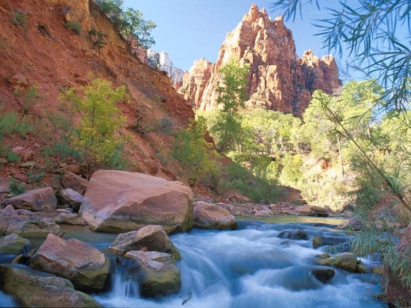 river flowing through canyon