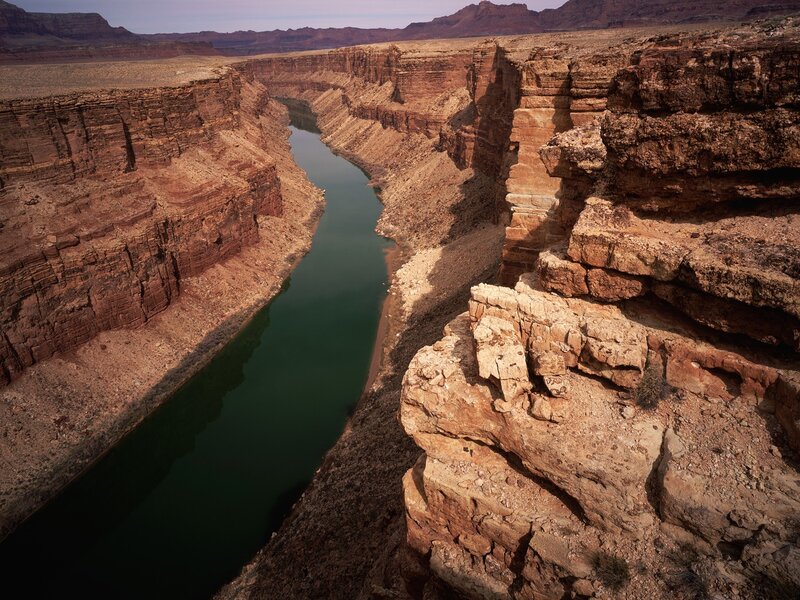 river flowing through canyon