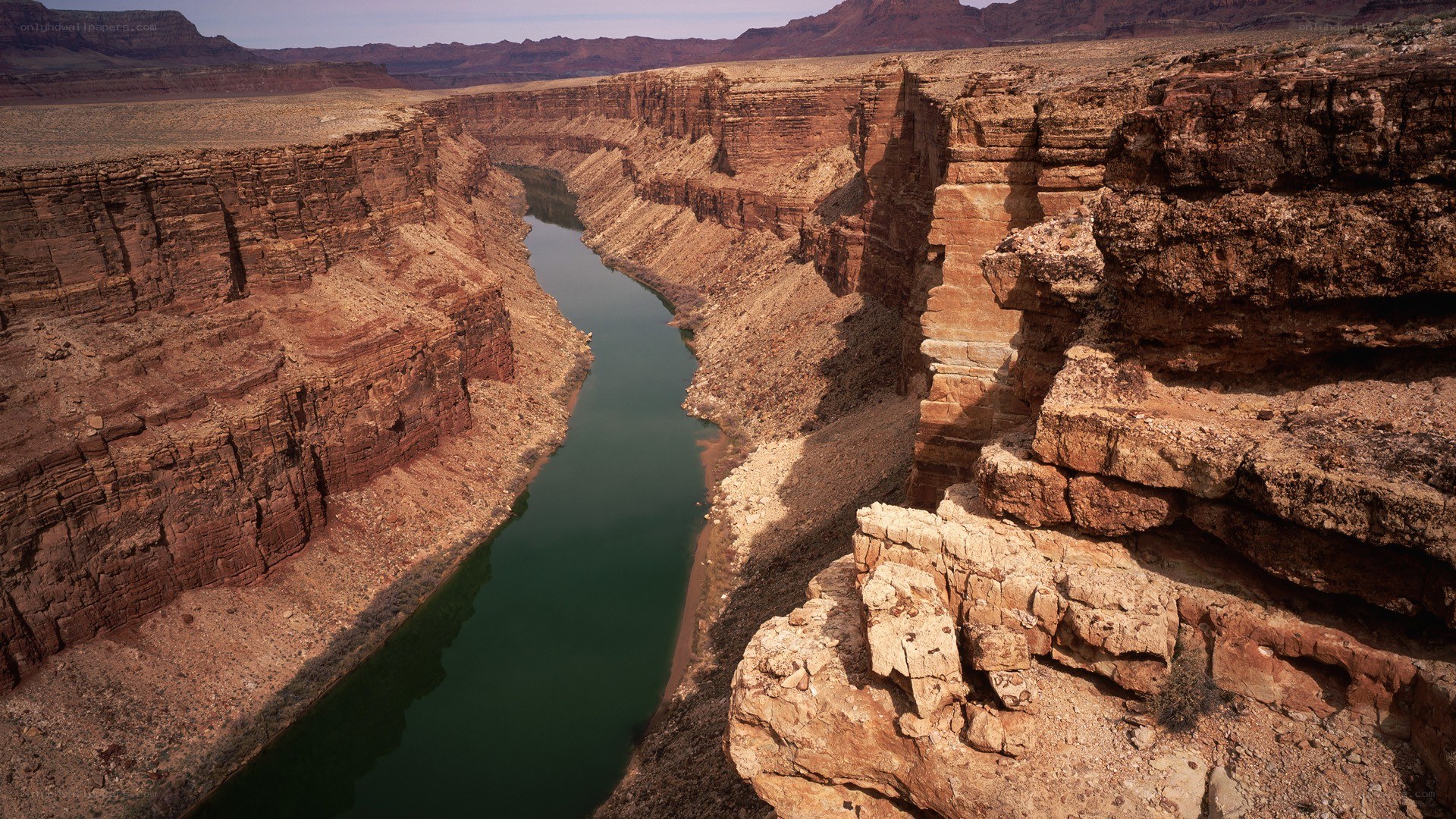 river flowing through canyon