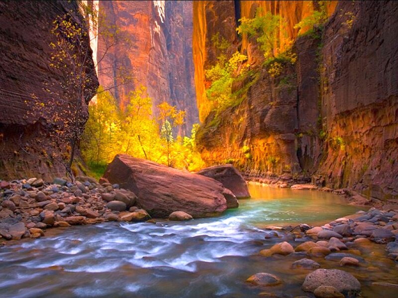 river flowing through canyon