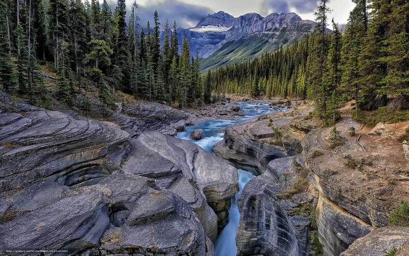 River Flowing Through Canyon — Blue, Dramatic, Afternoon, Photograph, Mountains