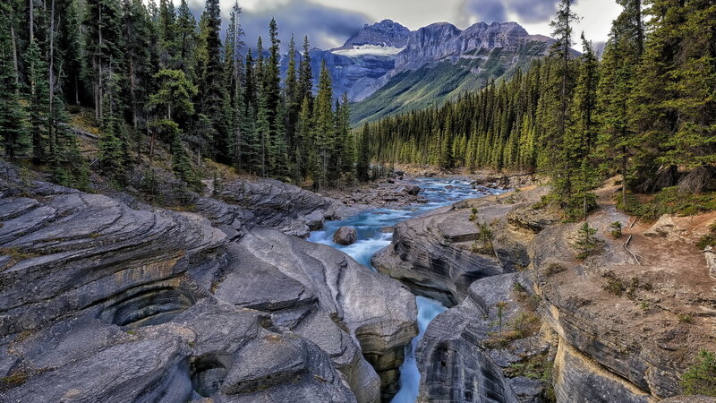 River Flowing Through Canyon — Blue, Dramatic, Photograph