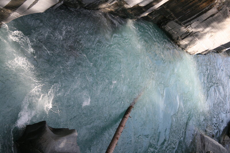River Flowing Through Canyon — Blue, Dynamic, Afternoon