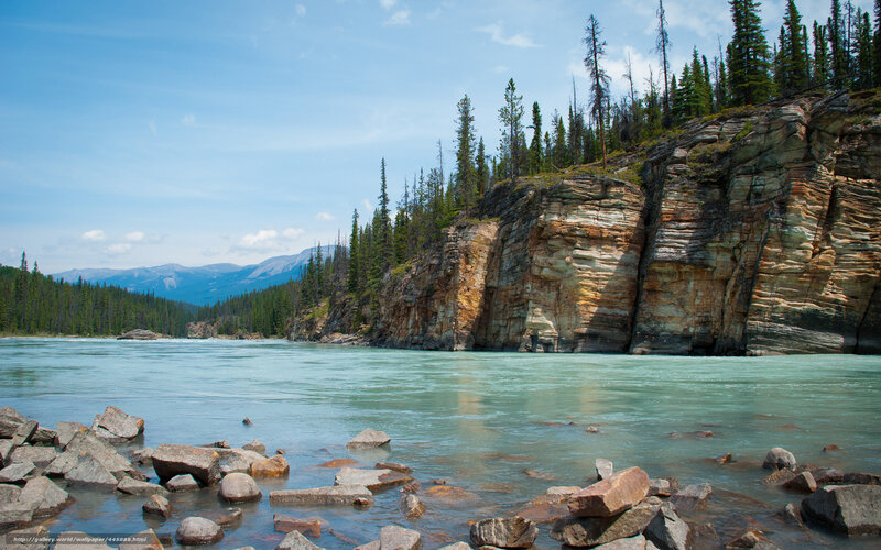 River Flowing Through Canyon — Blue, Serene, Afternoon, Photograph, Cliffs, Trees