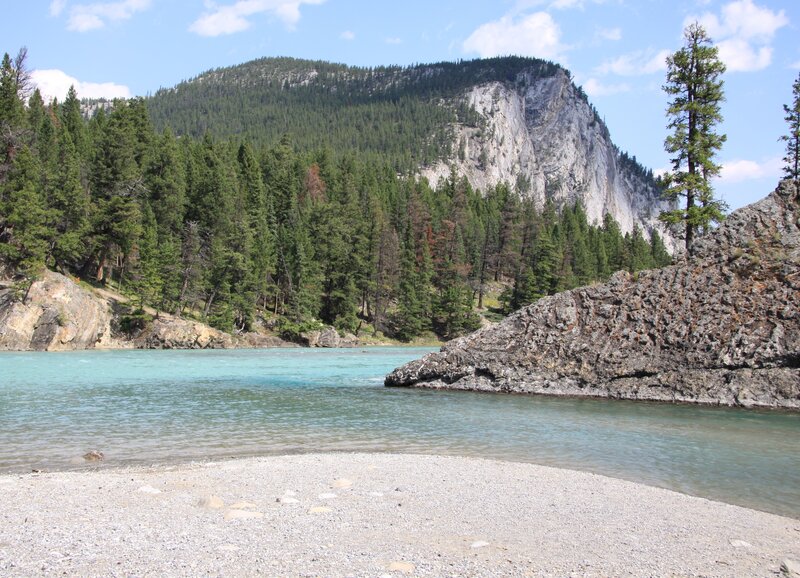 River Flowing Through Canyon — Blue, Serene, Afternoon