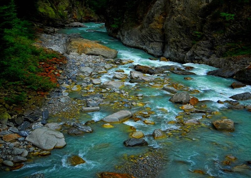 River Flowing Through Canyon — Blue, Serene, Photograph, Rocks