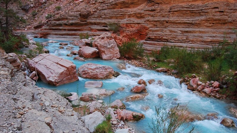River Flowing Through Canyon — Blue, Serene, Sunset, Photograph, Rocks