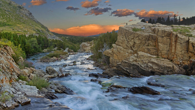 River Flowing Through Canyon — Blue, Serene, Sunset, Photograph