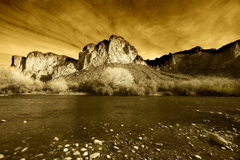 River Flowing Through Canyon — Brown
