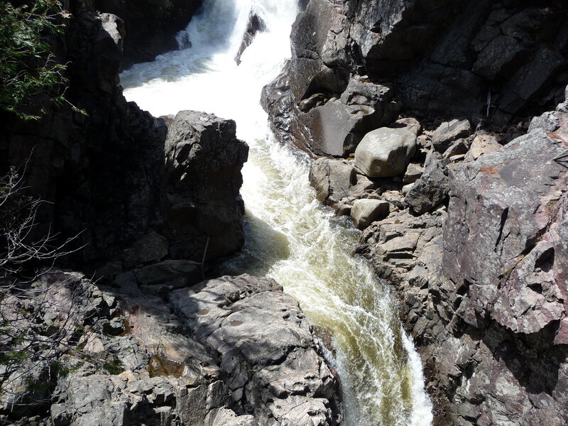 River Flowing Through Canyon — Gray, Dramatic, Afternoon