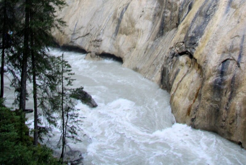 River Flowing Through Canyon — Gray, Dramatic, Photograph