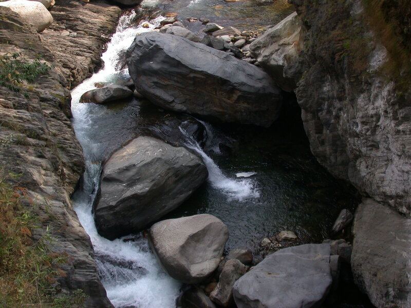 River Flowing Through Canyon — Gray