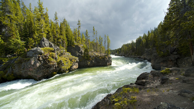 River Flowing Through Canyon — Green, Dramatic, Afternoon, Photograph, Trees, Rocks, Rapids
