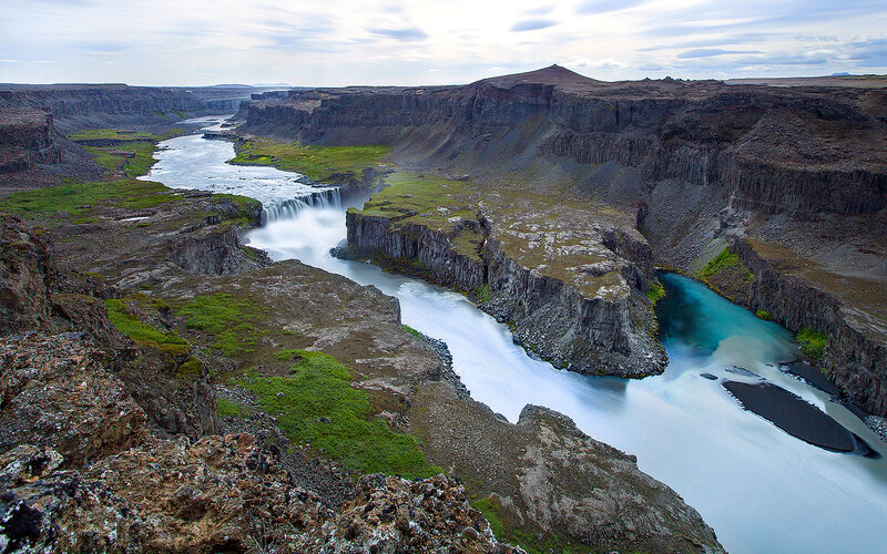 River Flowing Through Canyon — Green, Dramatic, Afternoon, Photograph, Waterfall, Cliffs