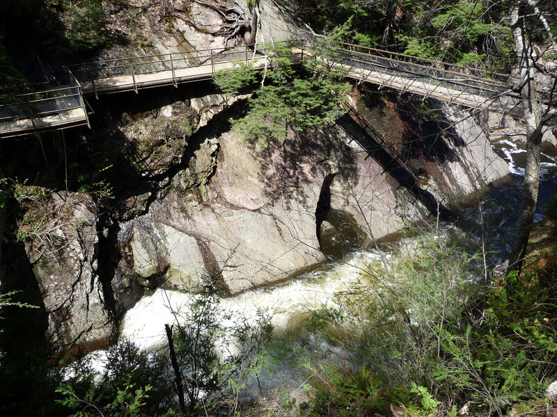River Flowing Through Canyon — Green, Natural, Afternoon, Photograph, Bridge