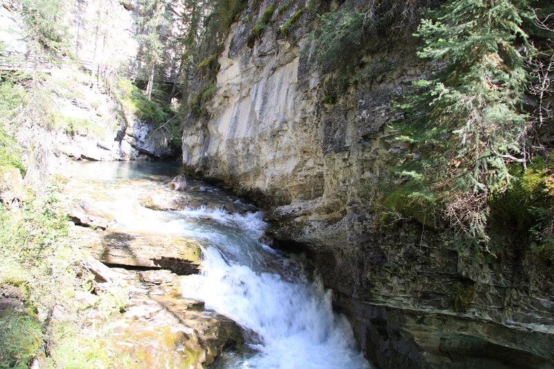 River Flowing Through Canyon — Green, Natural, Afternoon